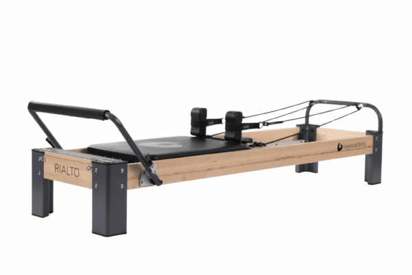 Rialto Reformer Pilates machine with maple frame and aluminum