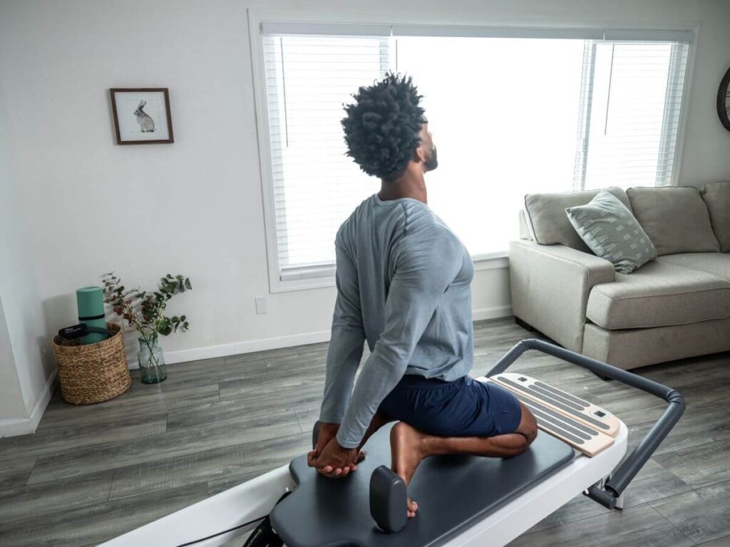 Person demonstrating Allegro 2 Standing Platform Extender in living room.