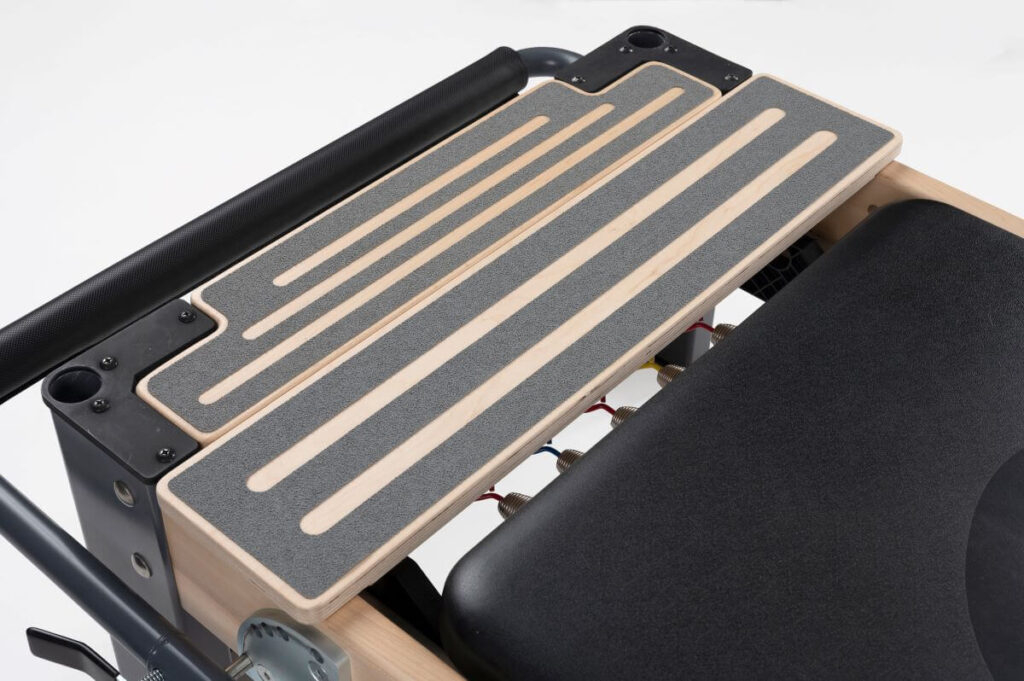 „Rialto“ stovėjimo platformos prailgintuvas ant reformerio Pilates treniruotėms.