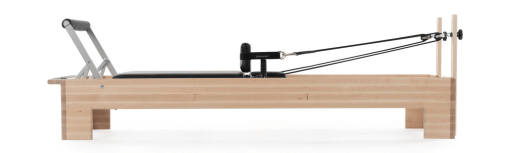 Studio Reformer STRETCH Pilates machine for tall users, side view.