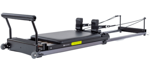 Metro IQ Reformer, compact Pilates equipment with telescoping frame.