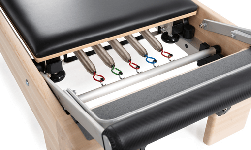 Classic Footbar and No-Roll Springbar on Balanced Body Reformer