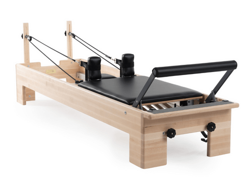 Pilates Reformer with Revo Footbar and Springbar adjustment system.