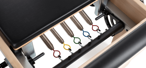 Balanced Body Signature Springs System with 5 springs for Pilates resistance.