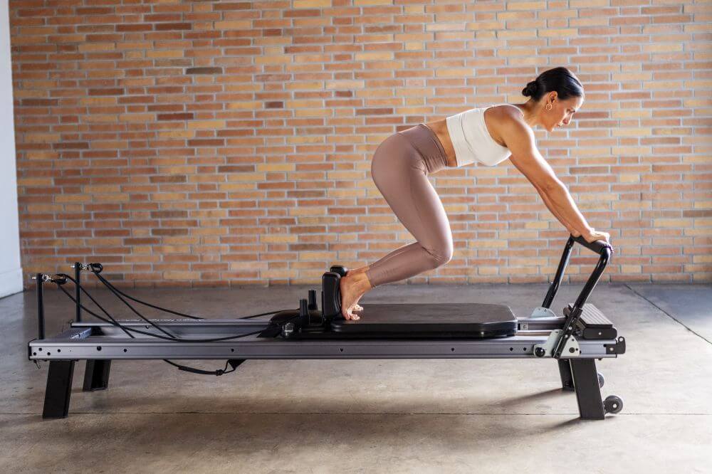 Allegro Nextgen Reformer naudojamas Pilates studijoje.