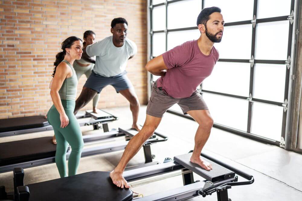 Pilates class using Allegro NextGen Standing Platform Extender.