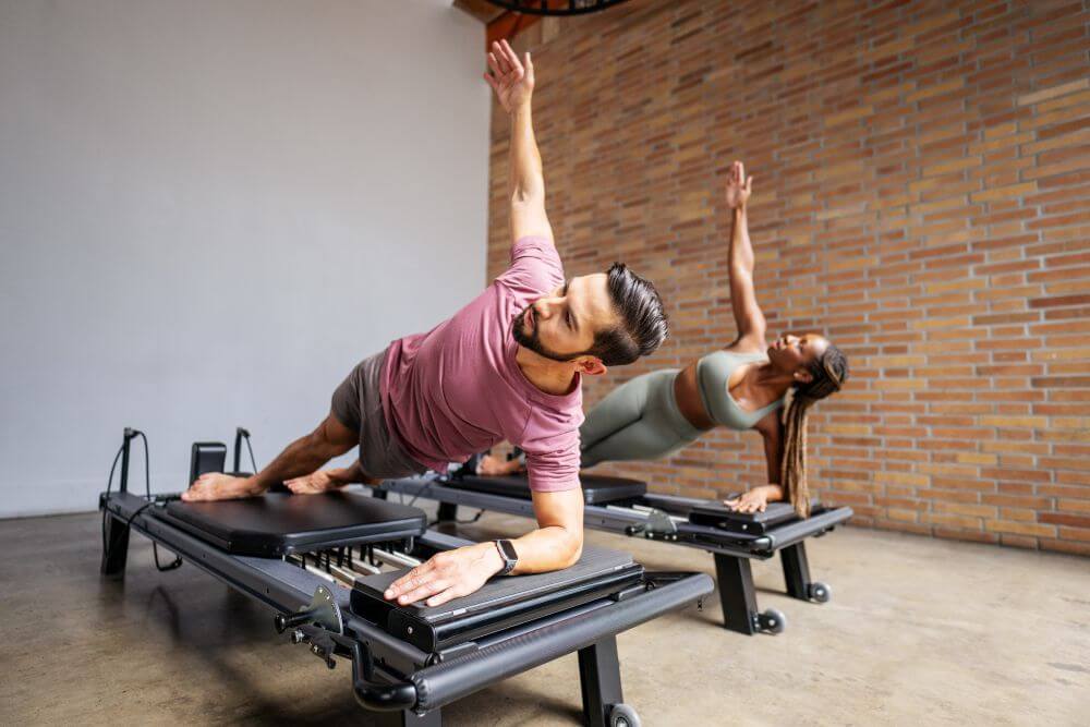Pilates exercises on Allegro NextGen Standing Platform Extender.